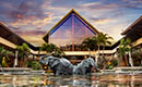 A statue of elephants in a courtyard pond at Loews Royal Pacific Resort.